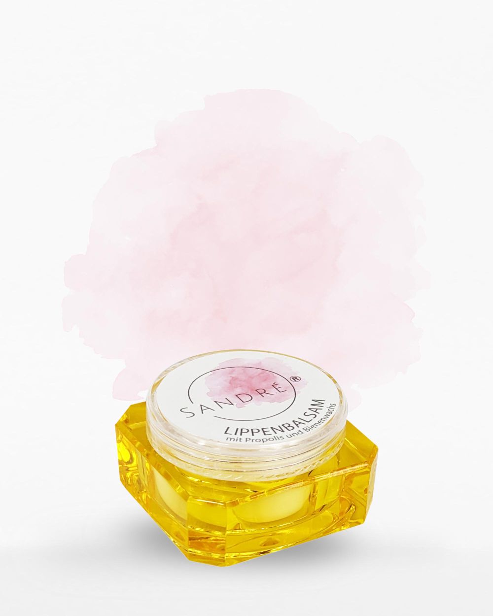 Lippenbalsam mit Propolis und Bienenwachs in einer gelben Tiegeldose
